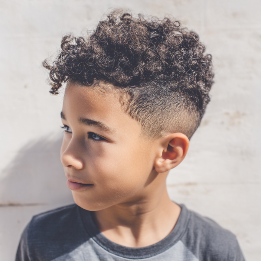 wplizer_an_image_of_a_boy_with_a_curly_fade_hairstyle