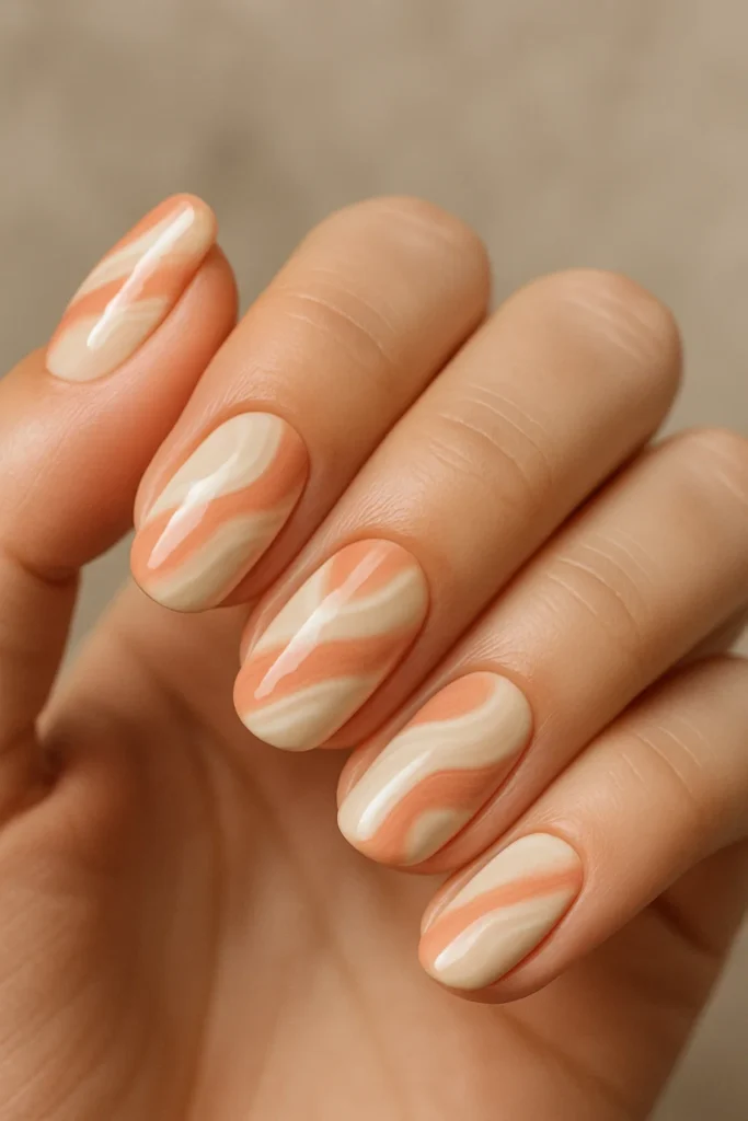 Sandy chic beach nails with trendy designs perfect for summer beach days.